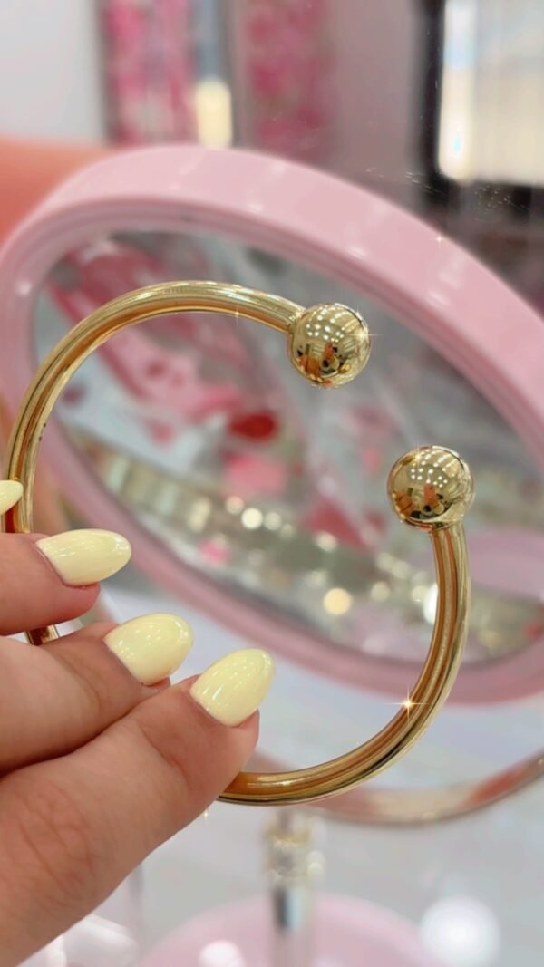 Cadena,dije, 2 manillas,2 anillos